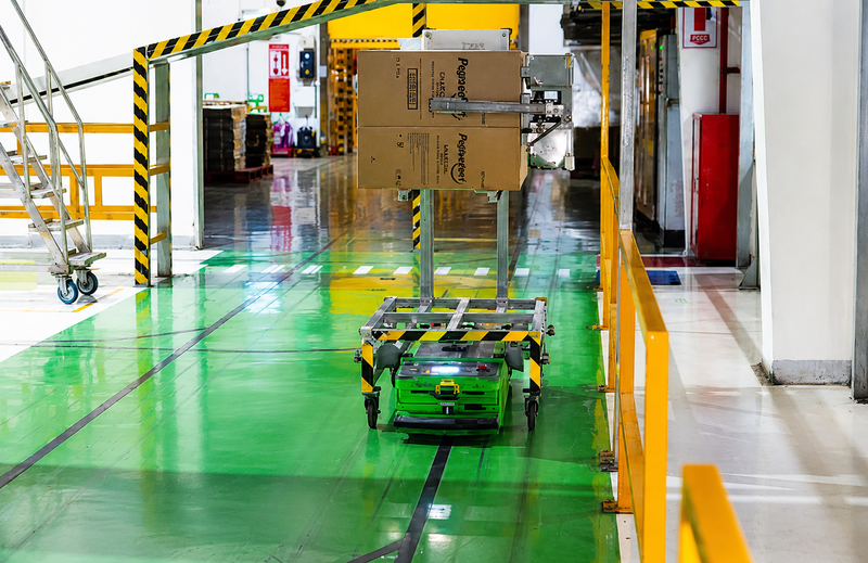 Eine Produktionslinie mit Robotern und Automatisierung in einem Unternehmen in einem Industriepark in Ho-Chi-Minh-Stadt. Foto: N.X.